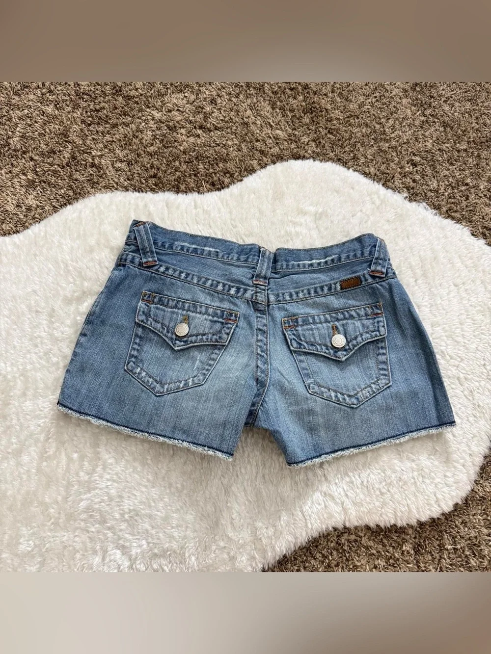 Y2k girly grunge low rise distressed light wash denim shorts